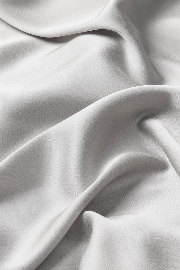 Close up of the bamboo sateen fabric: A warm grey
