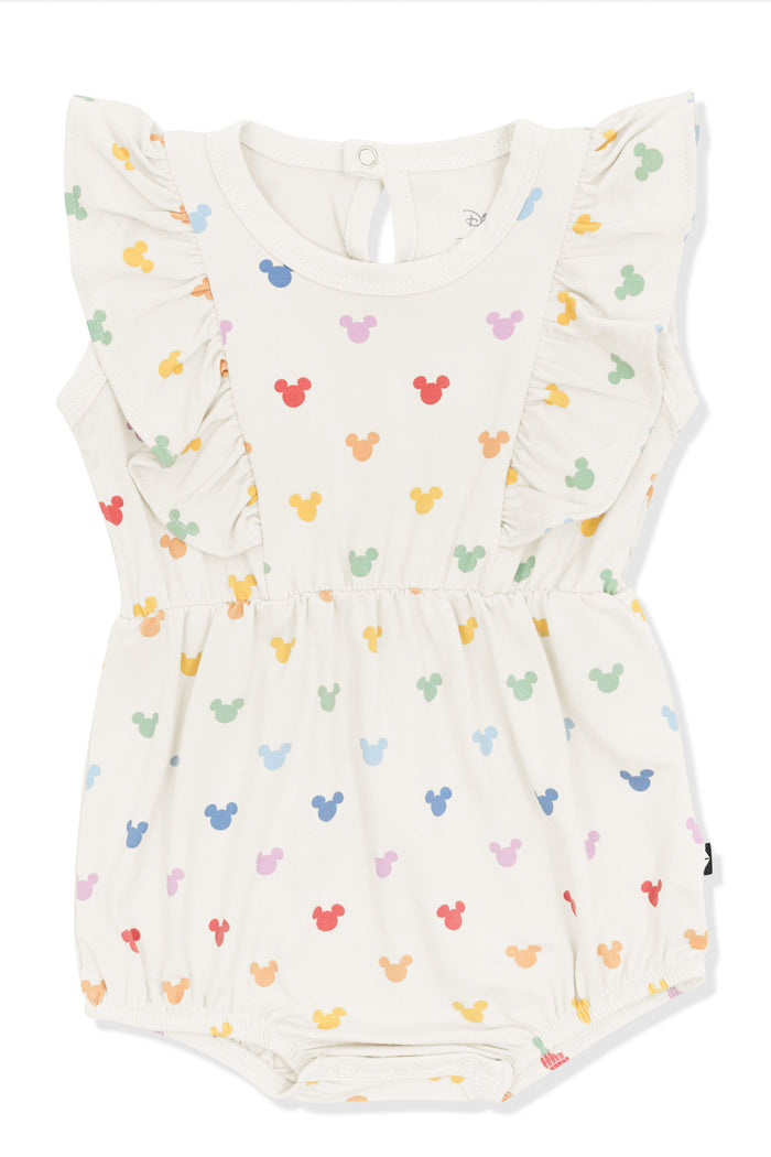 Bubble Romper with pastel mickey mouse pattern on an oat background