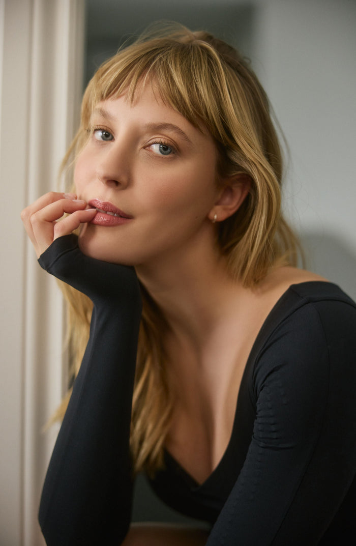 Close-up portrait wearing Elastique Athletics Iconic bodysuit