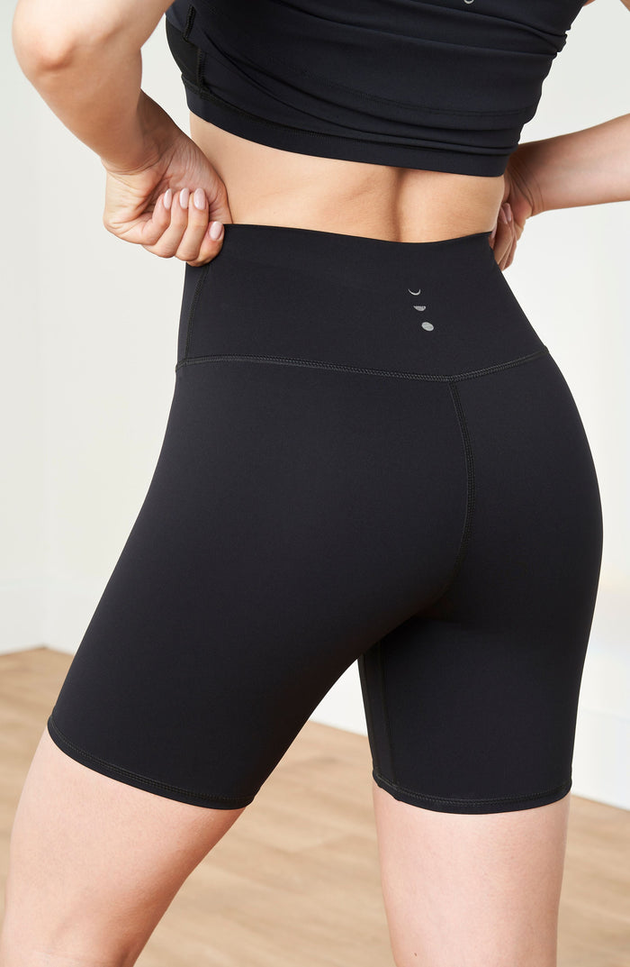 Close up back detail of the Elastique Athletics Lisse black biker shorts highlighting the high waisted fit and sculpted silhouette.