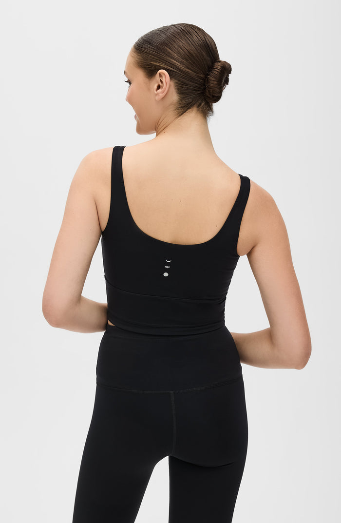 Back view of the Elastique Athletics Lisse Compression Bra in black highlighting the racerback silhouette and seamless fit.