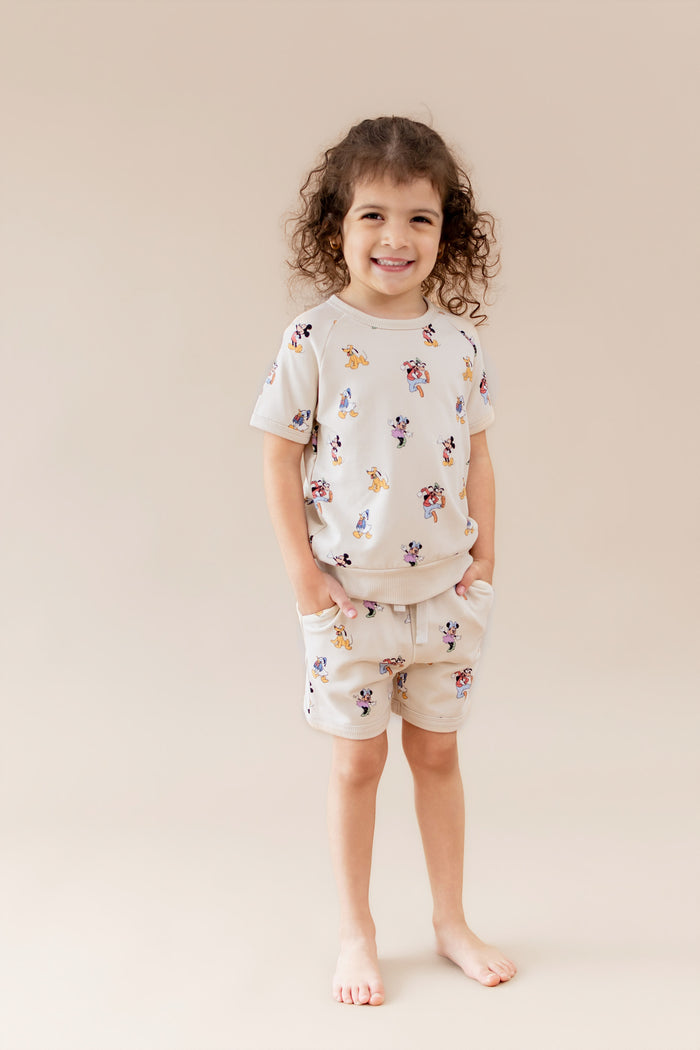 Mickey and friends patterned matching set on a young toddler girl