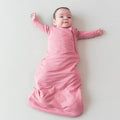 Infant wearing TOG 1.0 Sleep Bag in Apple Blossom