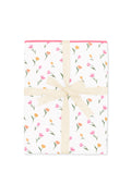 Youth Blanket in Tulip 1.0 shown in its packaging tied with a linen bow